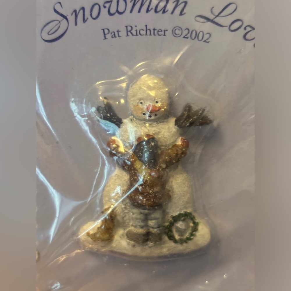 Vintage snowman with hugging boy pin